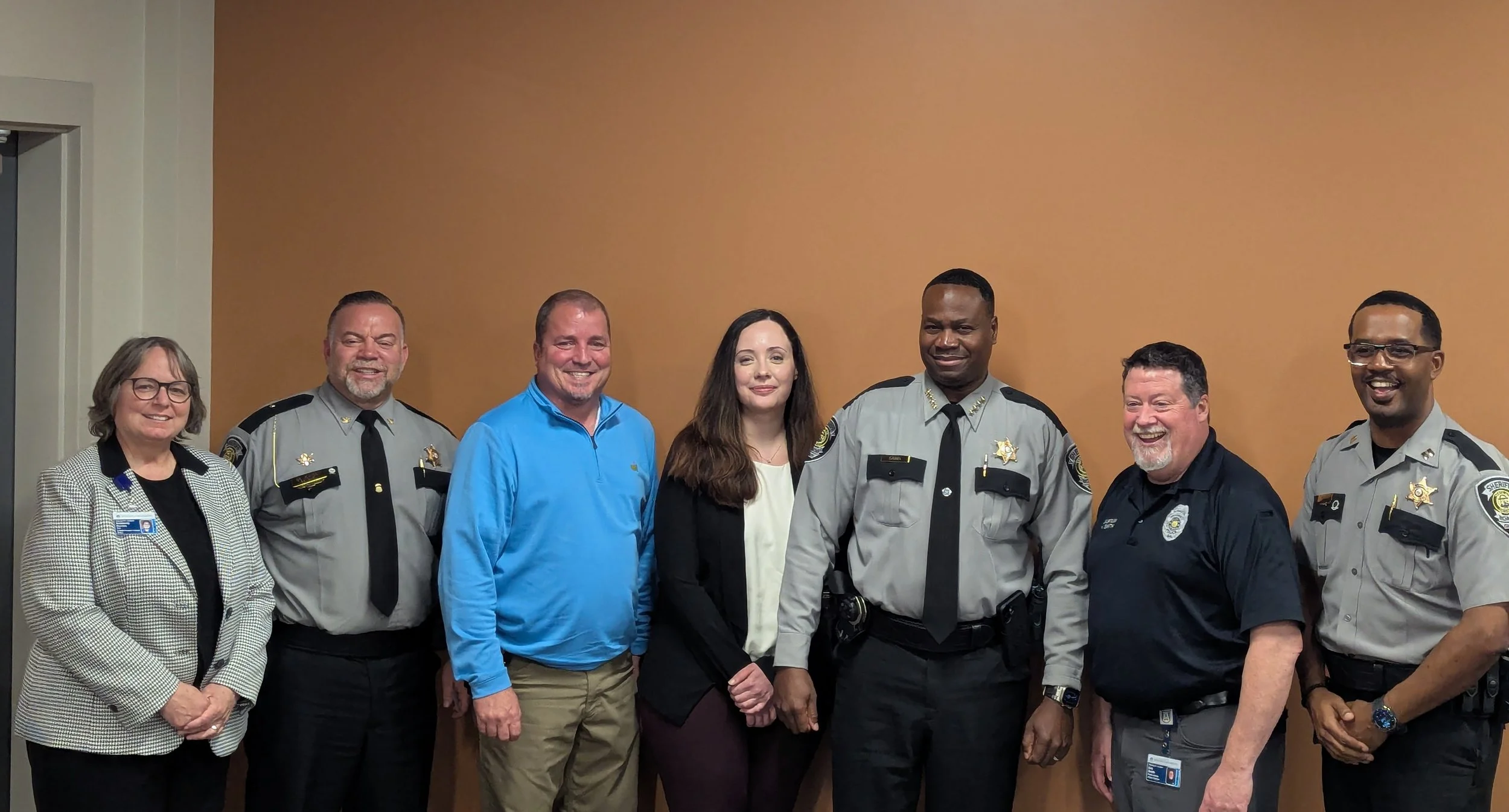 Moderator Kimberly Davies posed with panelists and other Richmond County sheriffs at the “Conversation on Gun Violence in the CSRA” panel discussion on Feb. 27. (photo by CM Wahl)